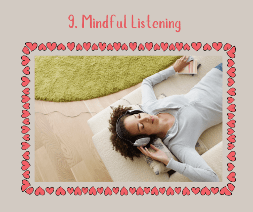 Woman lying on a cushion listening to music on headphones as part of mindful listening meditation. 