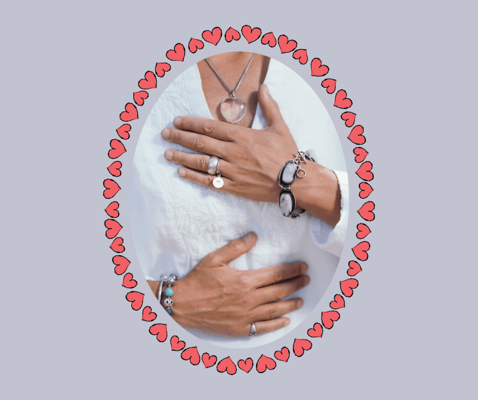 Woman placing her hands on her heart and stomach as part of a mindfulness technique for managing divorce stress.