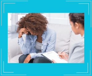 Woman speaking to a female therapist.