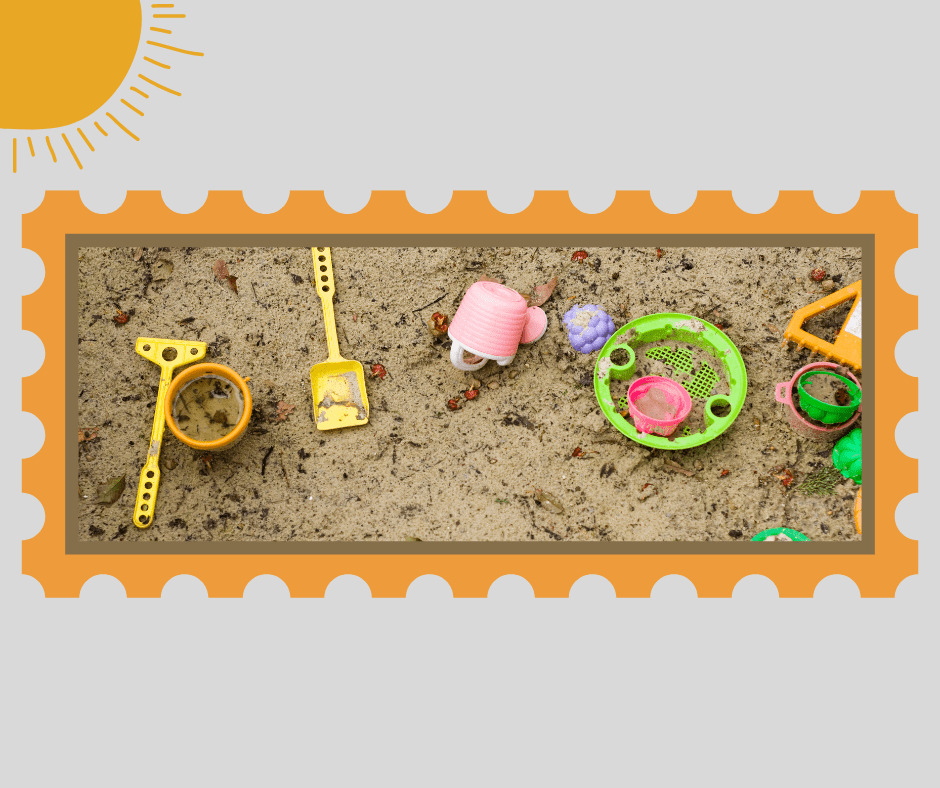 Picture of a sandbox filled with kids' toys.